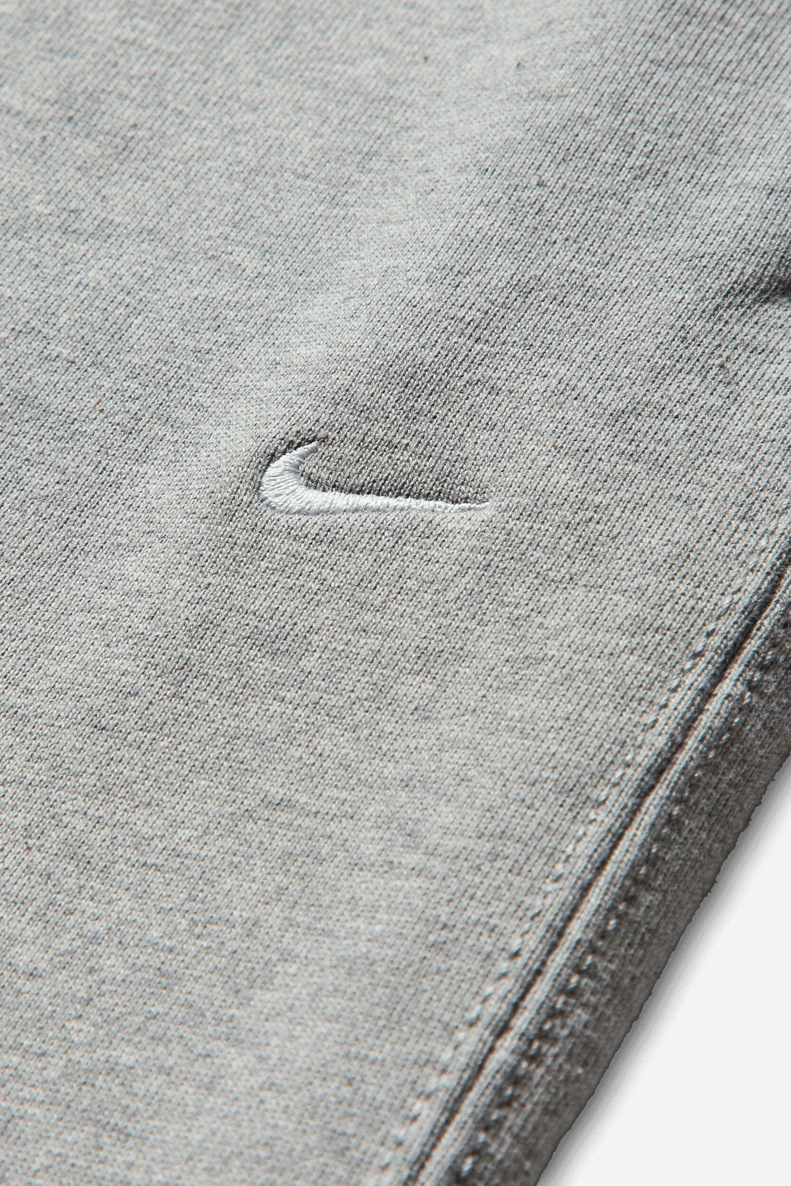 Nike Solo Swoosh Men's Fleece Open-Hem Pants
